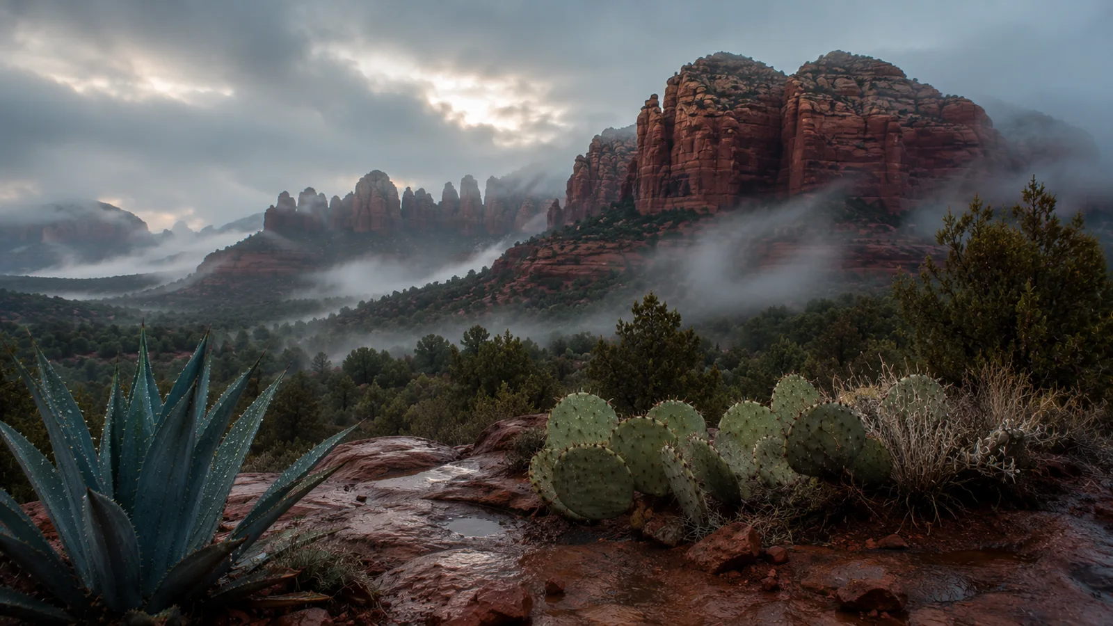 AI-generated illustration: fog drifting around red rocks after rain