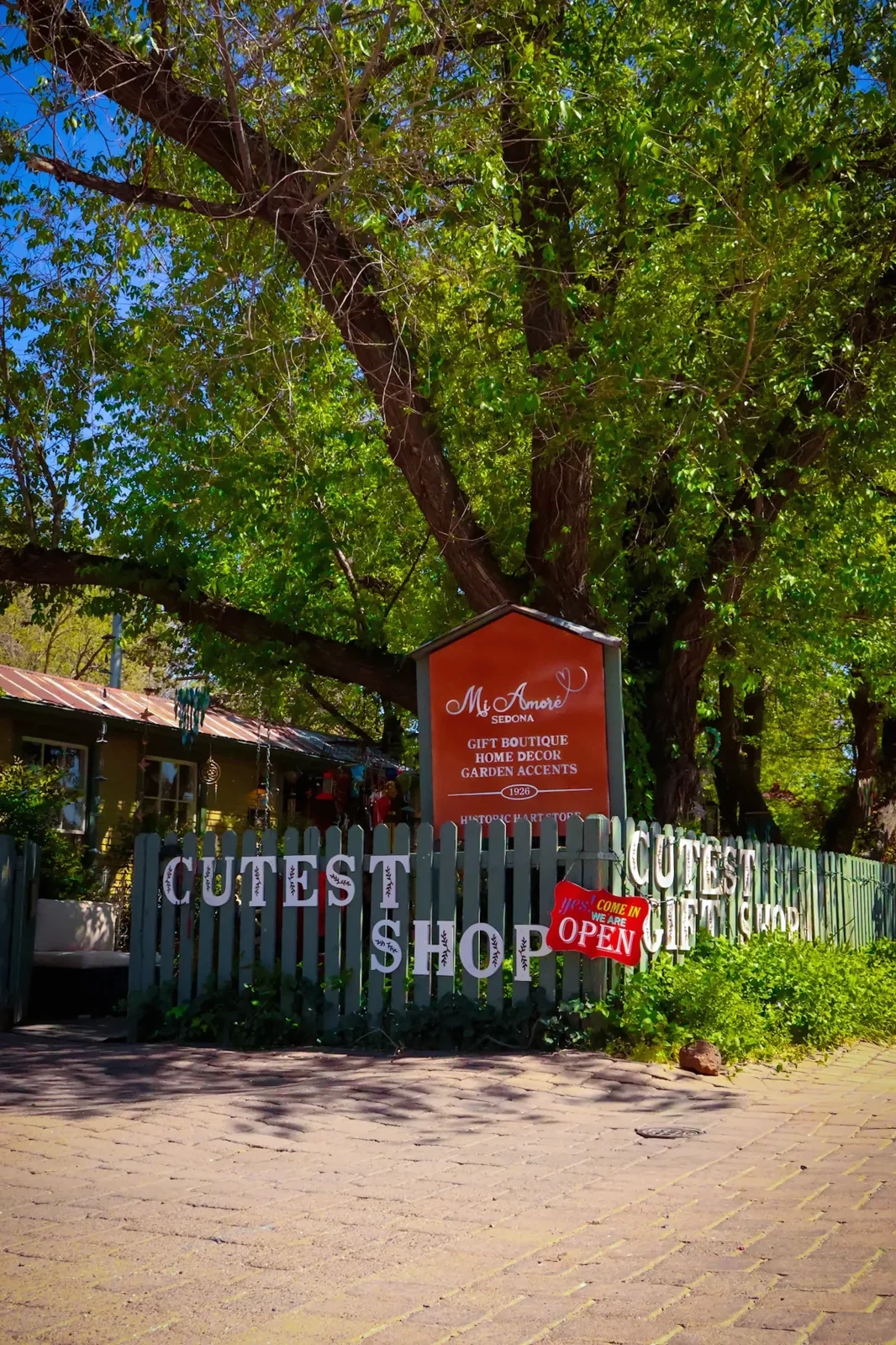Mi Amoré Sedona shop sign and garden gate at the historic Hart Store