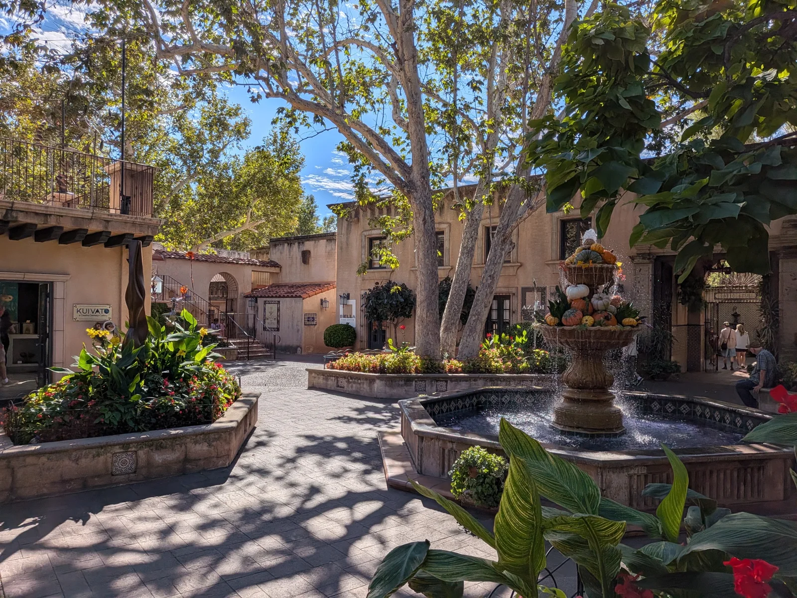 A sycamore-shaded courtyard and fountain at Tlaquepaque South, photographed in October 2026